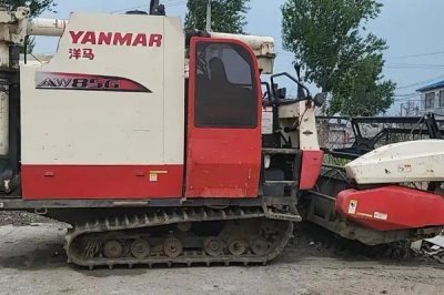 洋馬85收割機(jī)撒糧嚴(yán)重如何解決，割臺(tái)下有糧可調(diào)整伸縮齒的位置