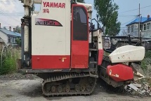 洋馬85收割機(jī)撒糧嚴(yán)重如何解決，割臺(tái)下有糧可調(diào)整伸縮齒的位置