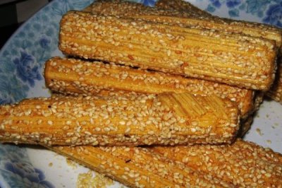 北方小年吃哪些東西，餐桌上可見(jiàn)餃子、蔥油餅、蒸花饃等食物